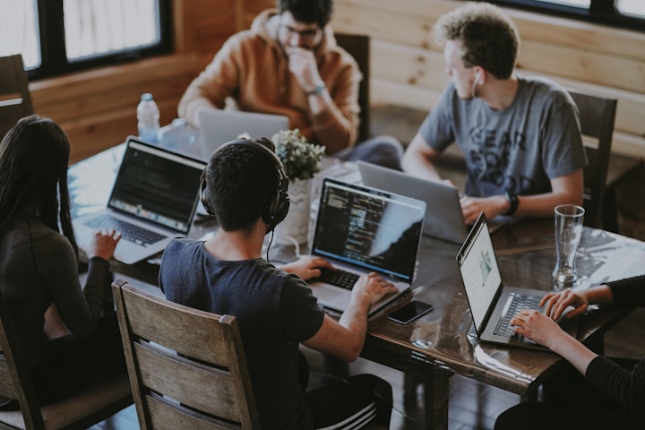 Startup team collaborating in a technology workspace