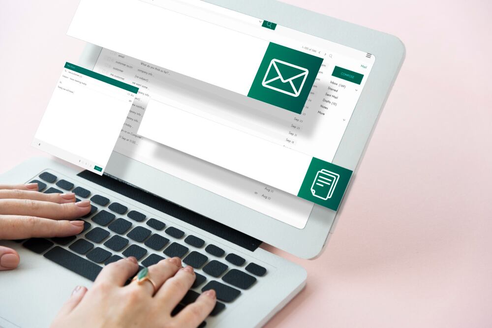 Person using a laptop with email interfaces open, representing an email marketing agency in Chandigarh at work.