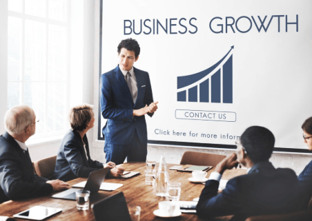 Business team discussing growth strategy, representing a leading video editing agency Chandigarh.